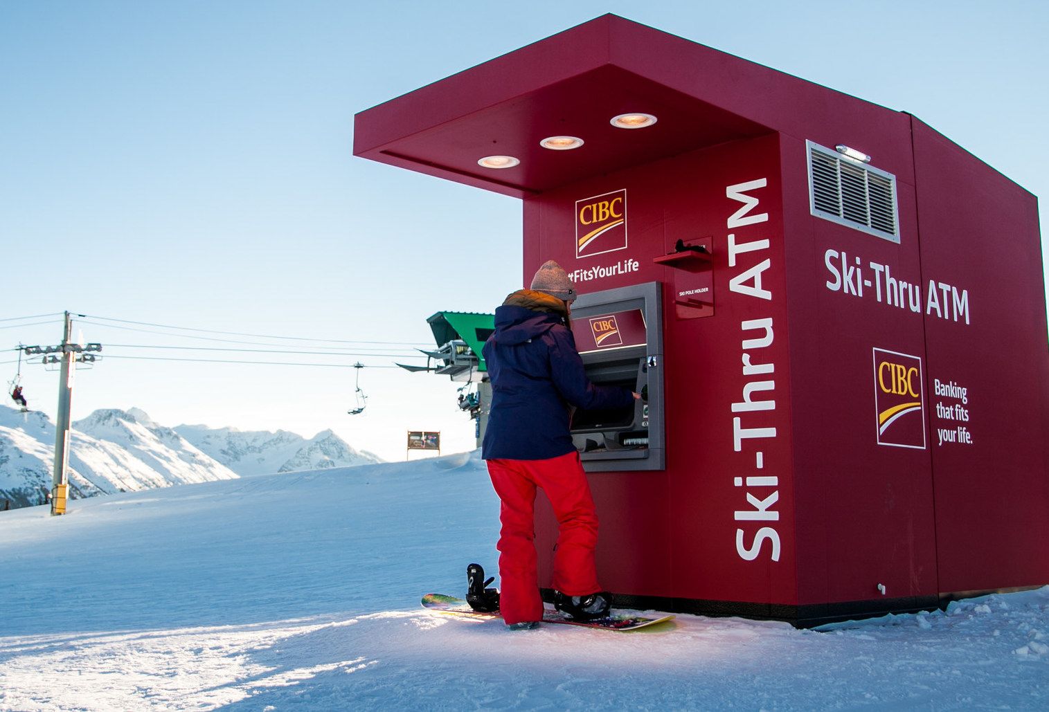 Skier using an ATM.