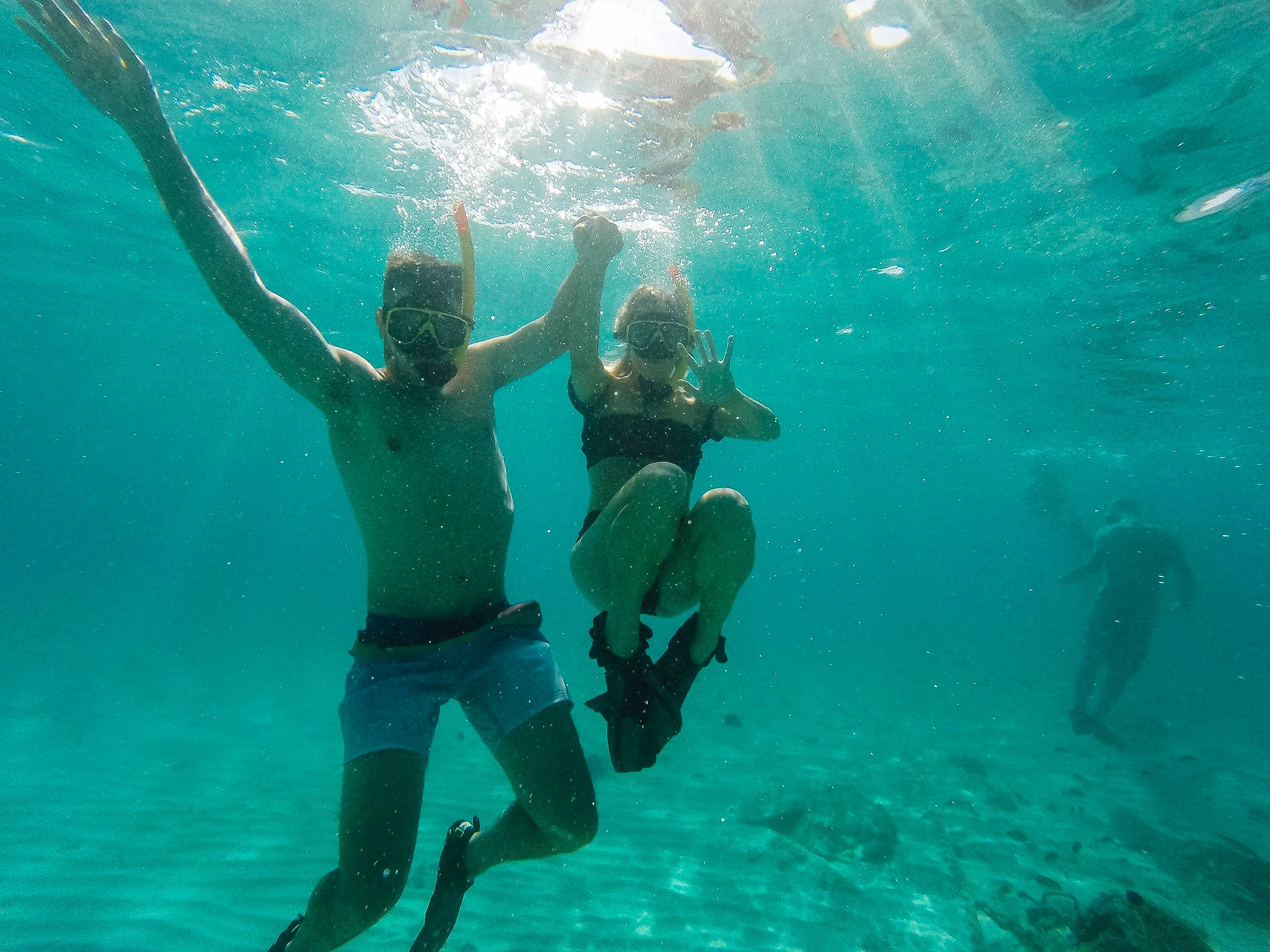 Couple snorkeling in Aruba.
