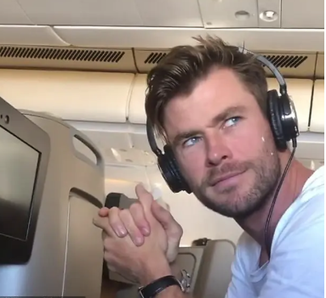 Chris Hemsworth wearing headphones.