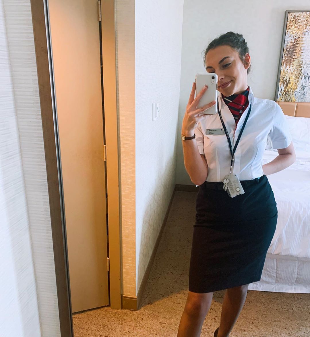 Flight attendant taking a selfie