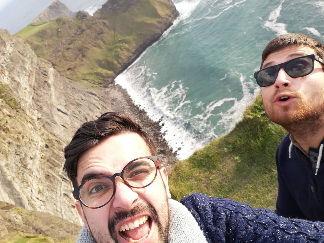 Two men on a cliff