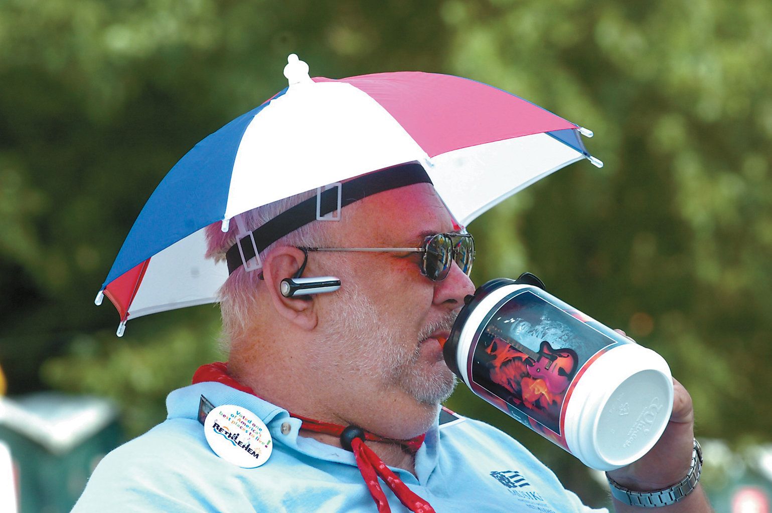 Man wearing an umbrella hat