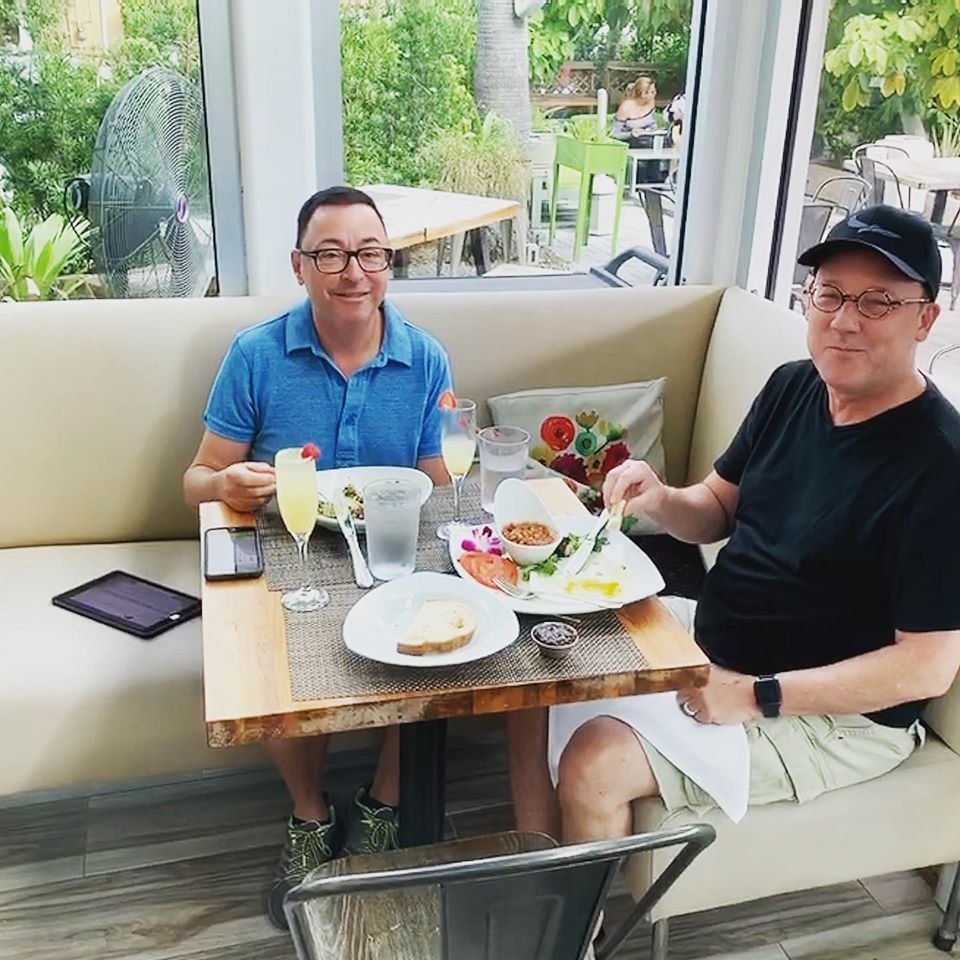 Men eating at Miami's Organic Bites 