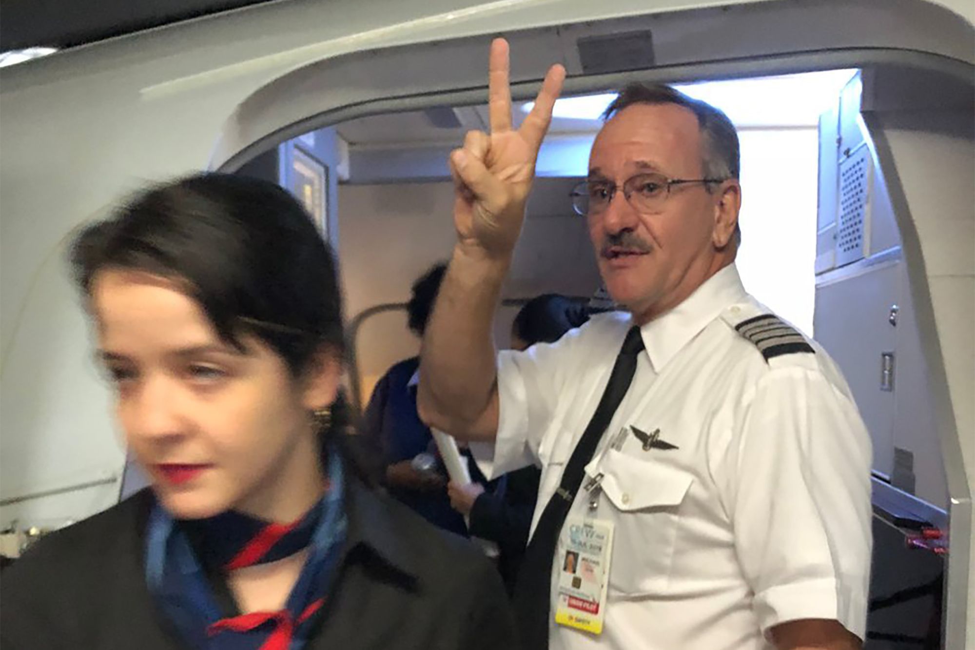 Pilot giving the peace sign 