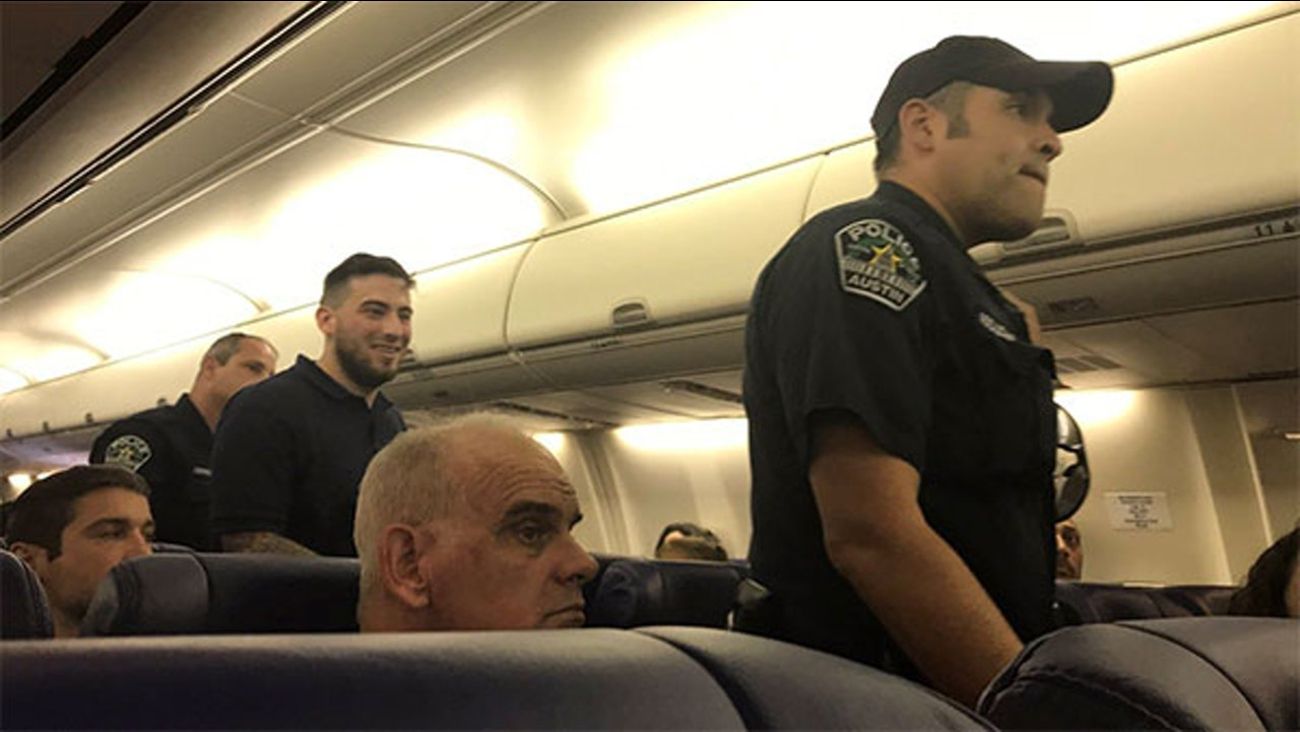 Police intervening in an incident on Southwest Airlines