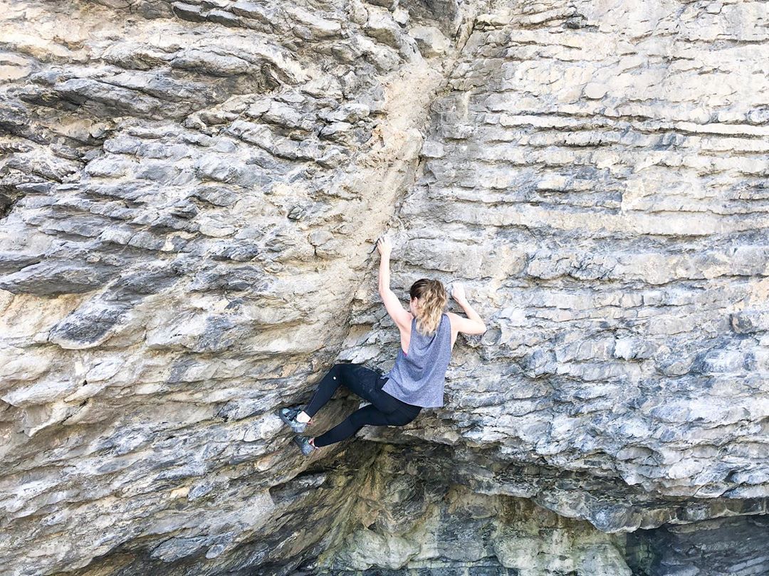 Woman enjoying rock-climbing in Ireland