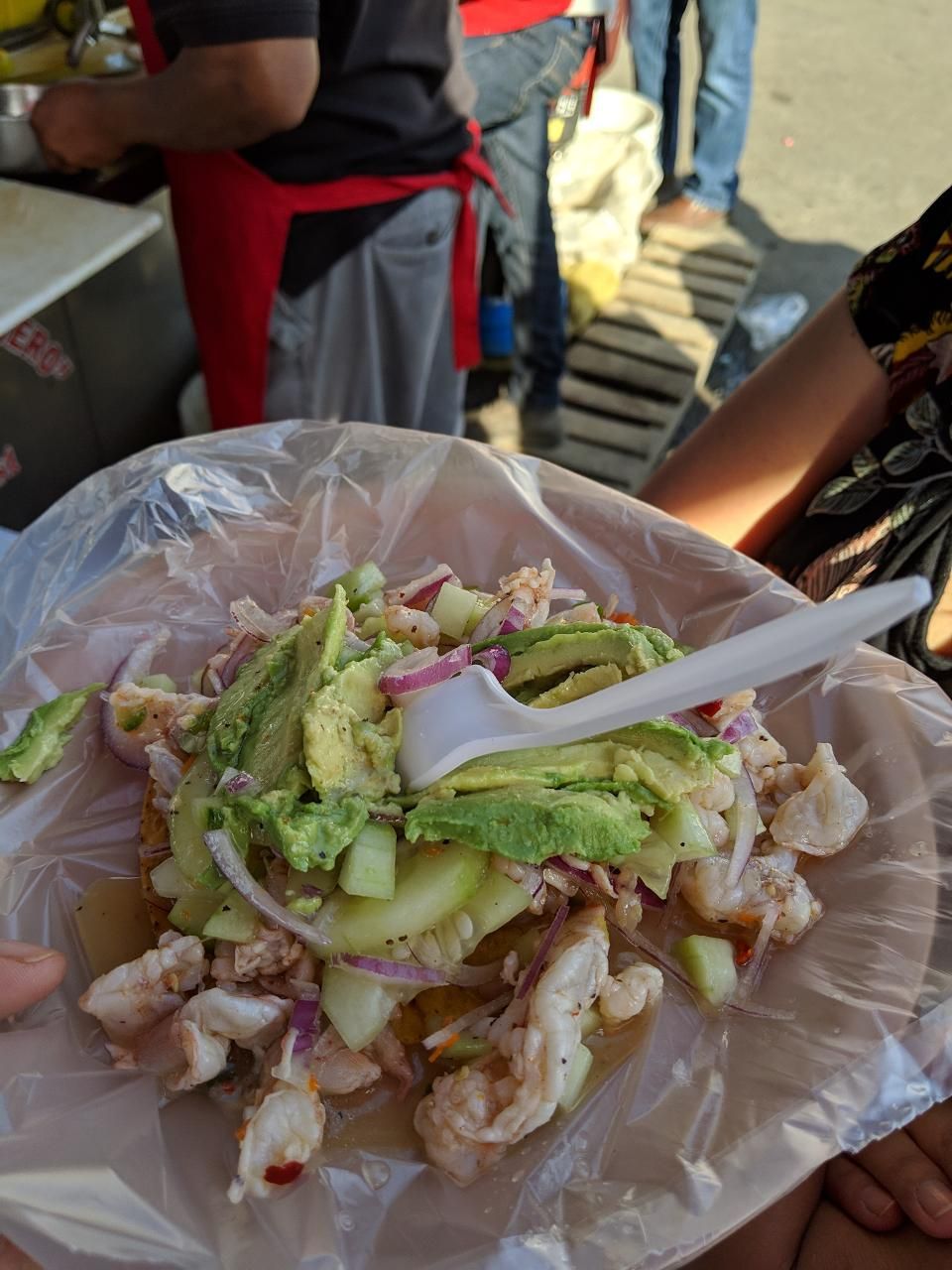 a traditional mexican dish aguachile, served with guacamole