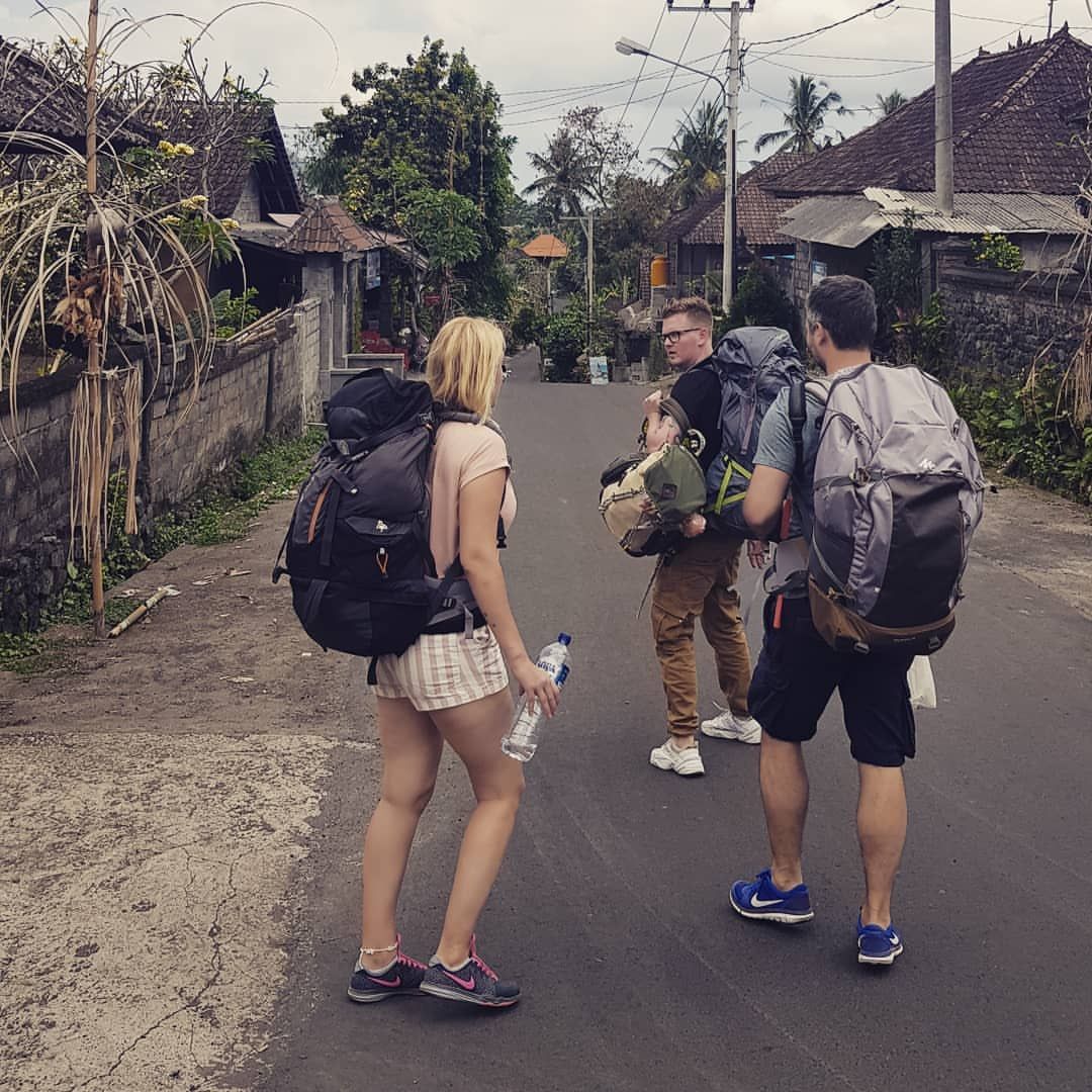 a group of backpackers backpacking through bali
