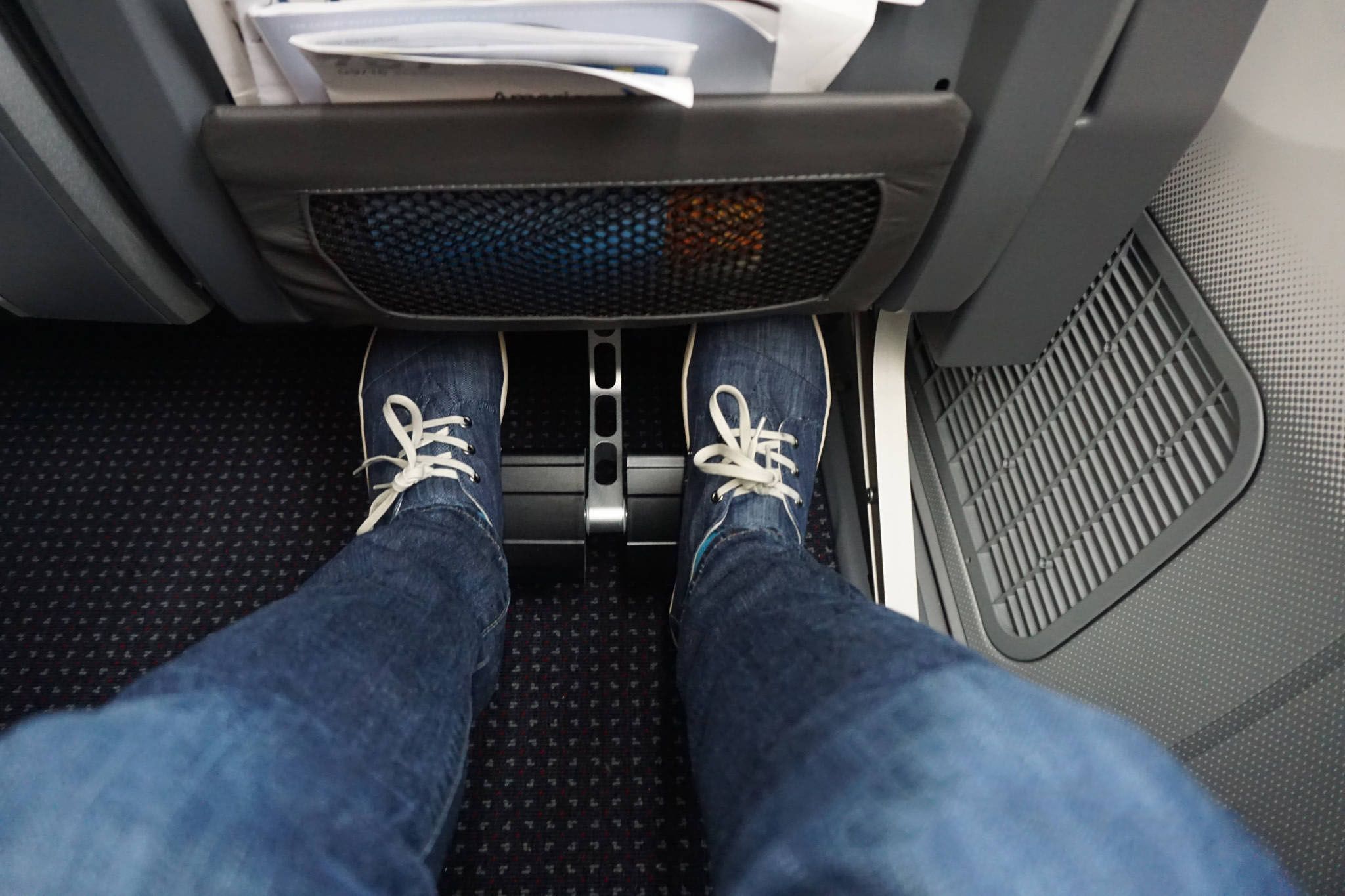 Feet with not a lot of room in Premium economy