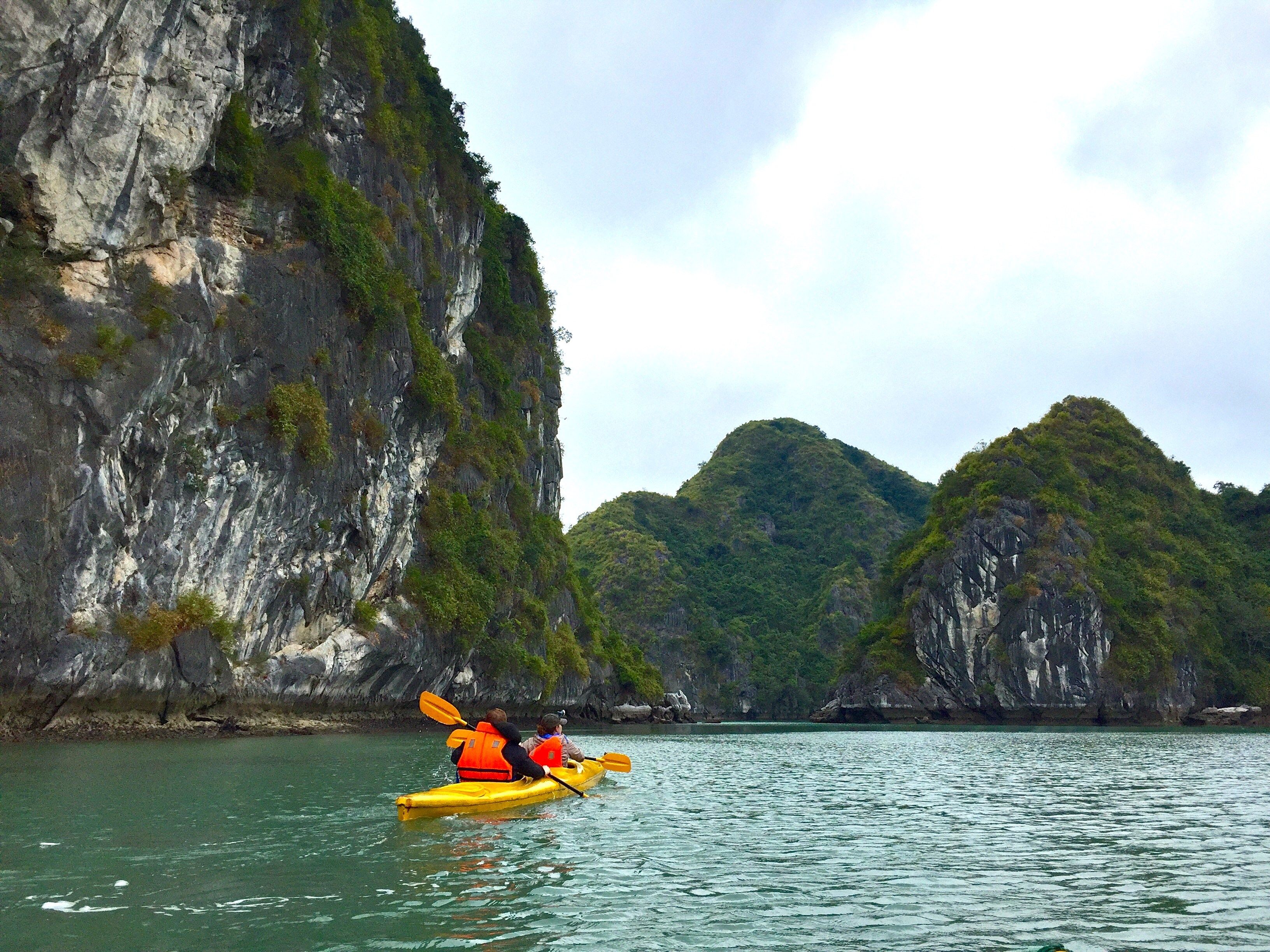 Kayakers off Tam Coc shore
