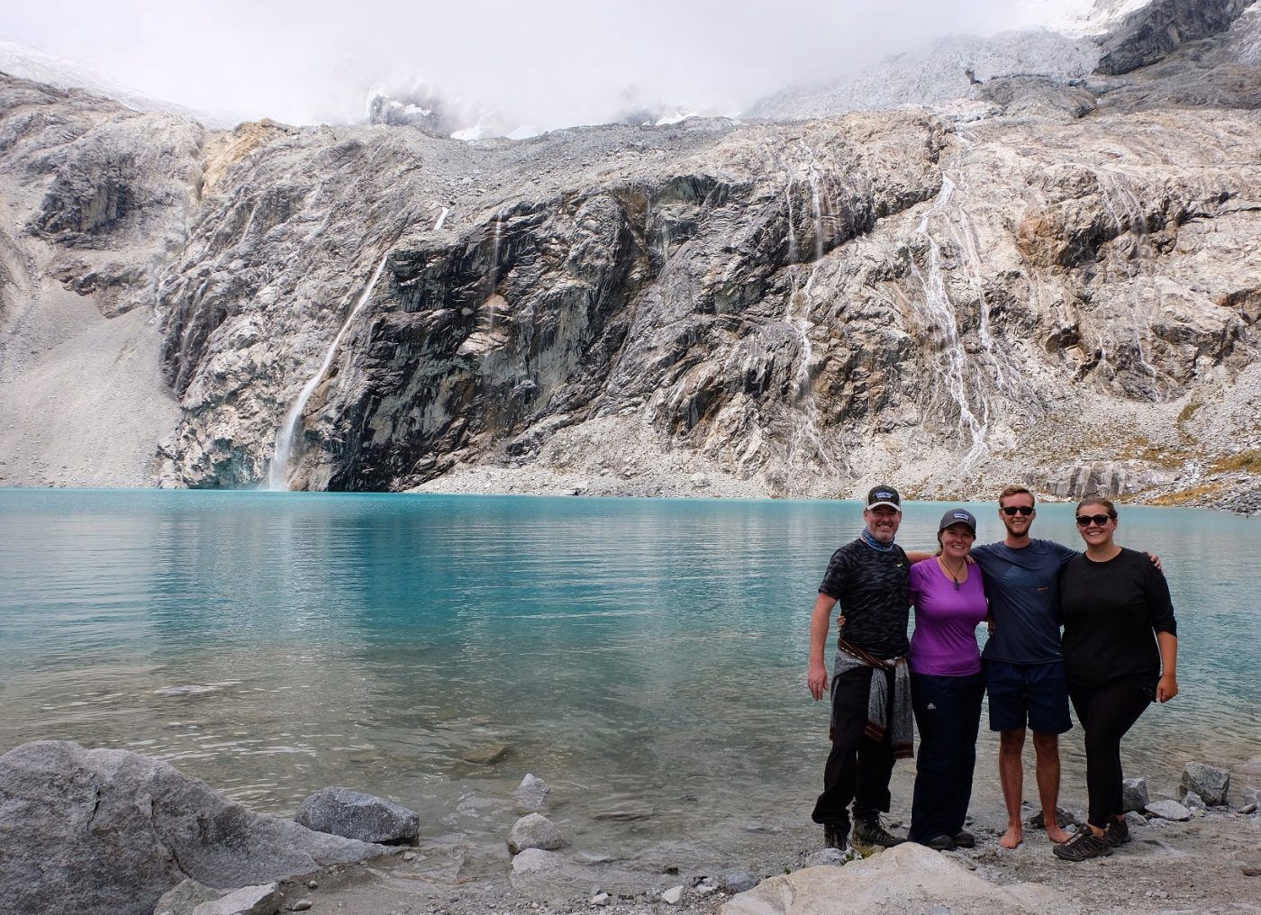 Group standing in front of Laguna 69