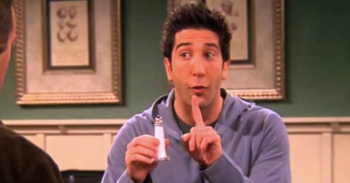 ross with a small bottle on friends