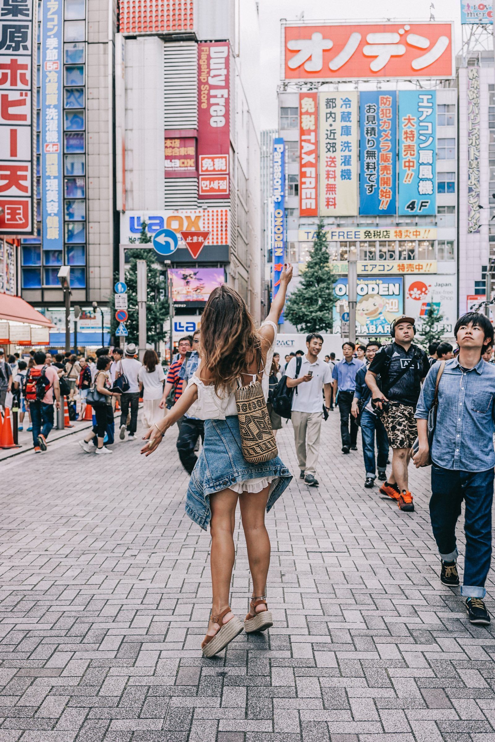 Woman on busy street in Tokyo