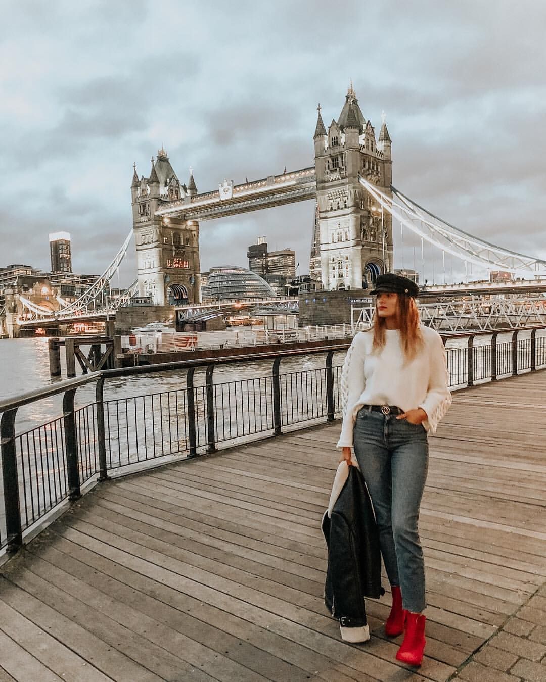 Woman standing near bridge in London