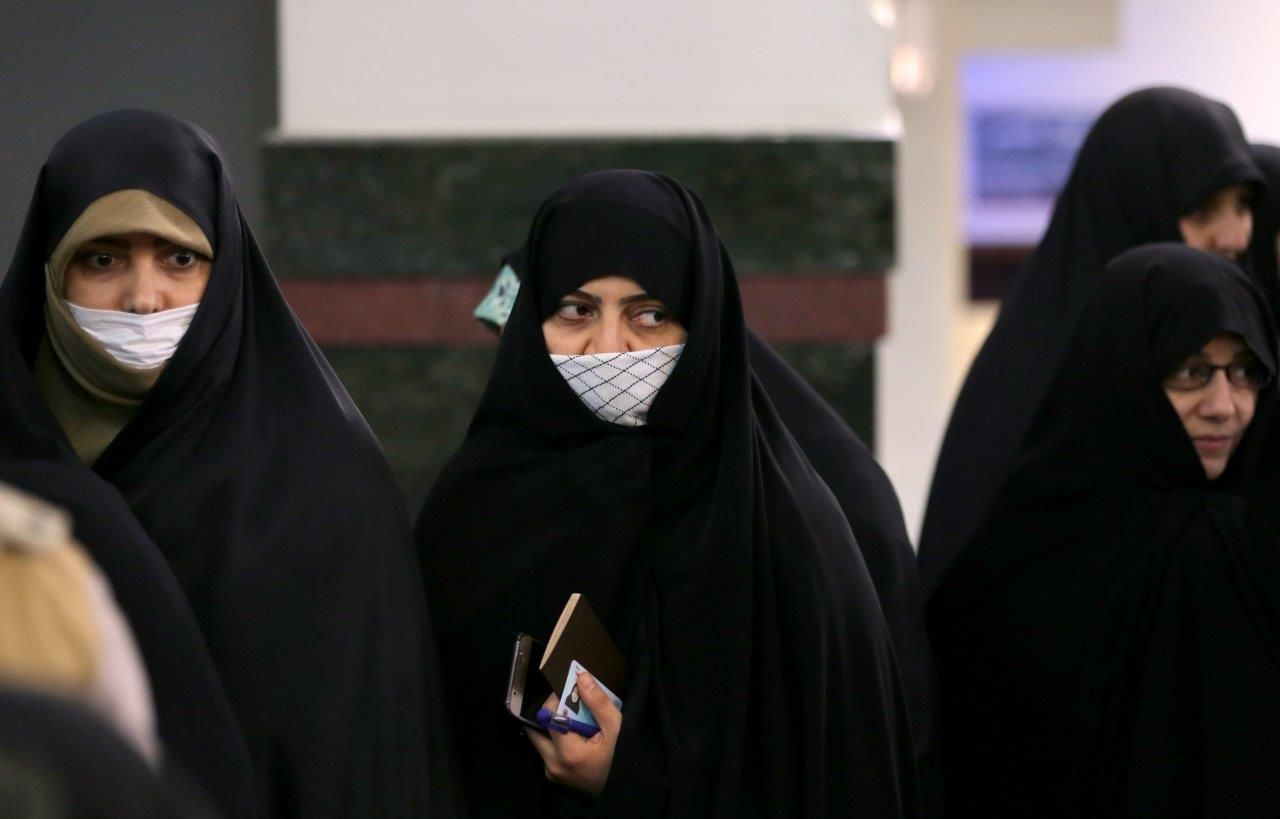 Women in Iran wearing masks