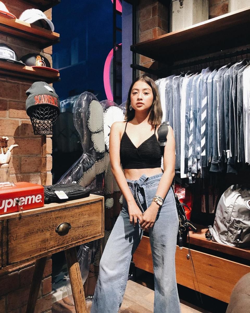 Woman posing in a store in the Philippines