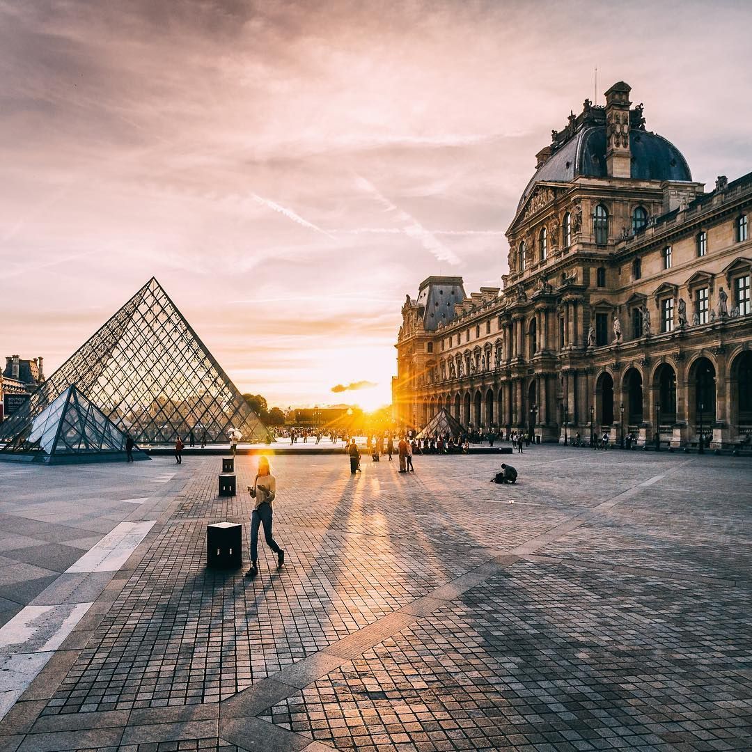 View of the Louvre Museum at sunset