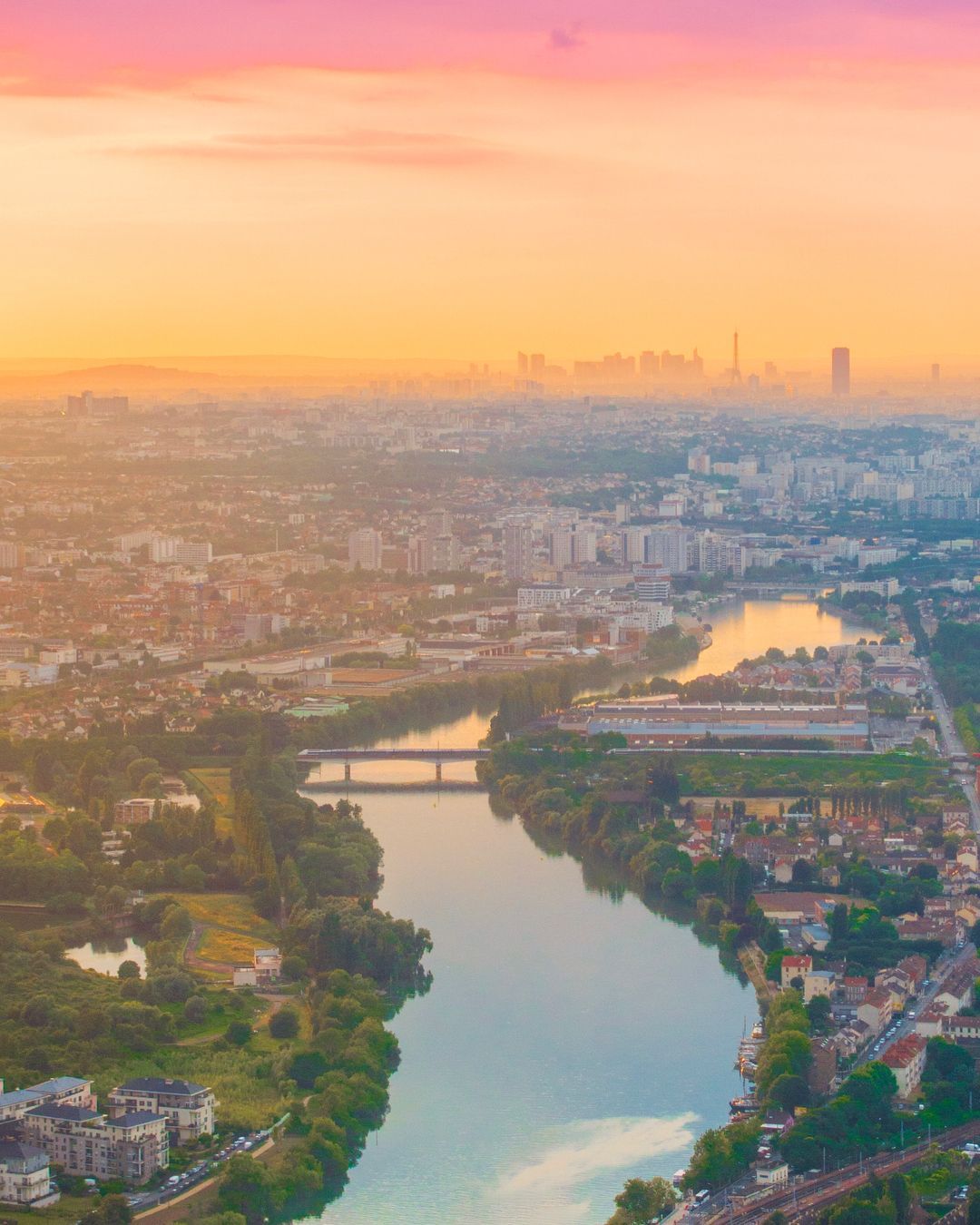 Aerial view of the Seine and Paris at sunset