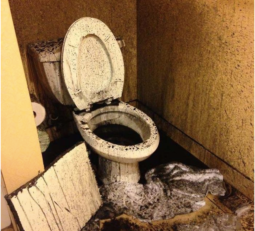 Black Liquid Exploded Out Of Toilet