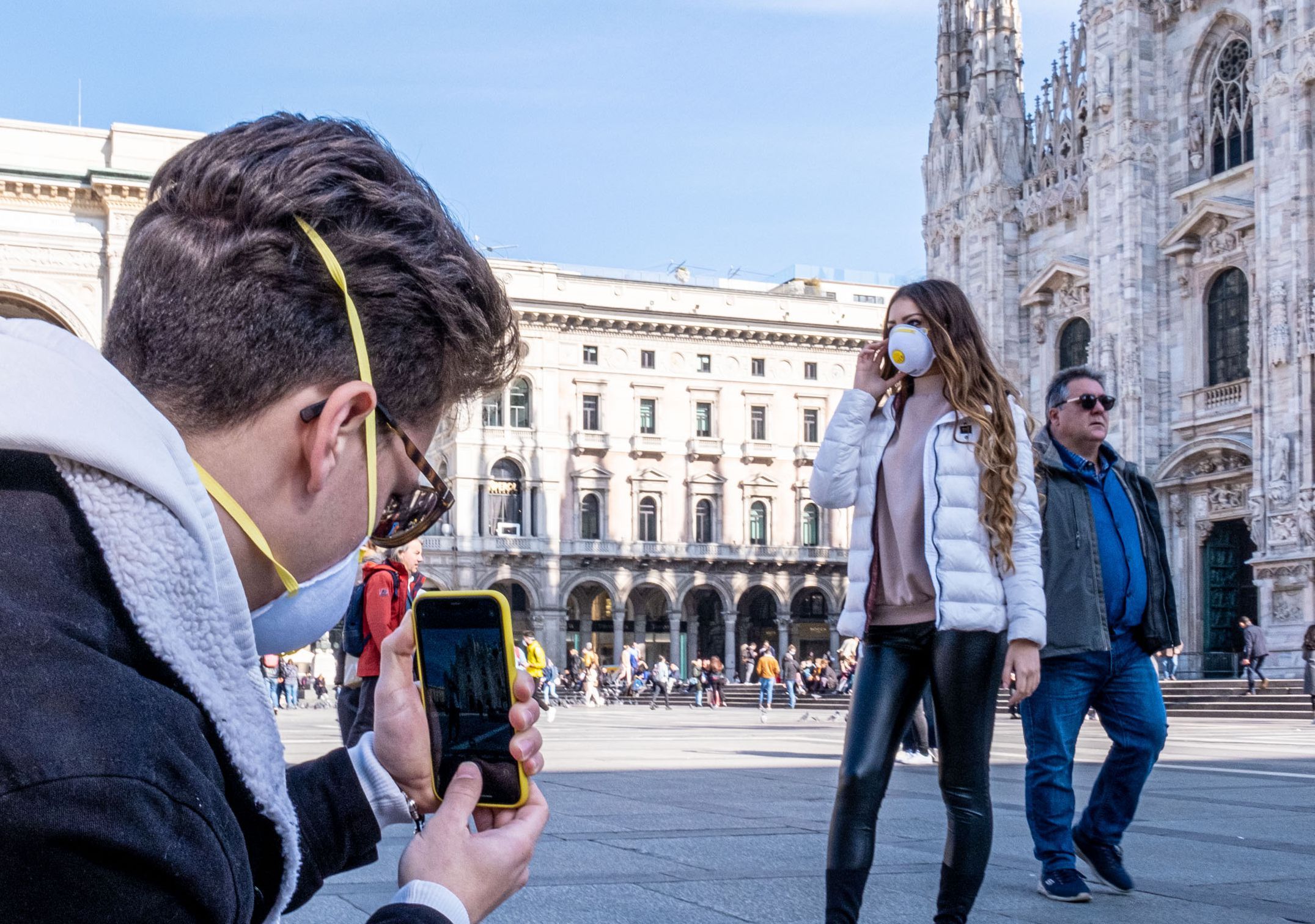 Influencer posing in front of Duomo in Milan