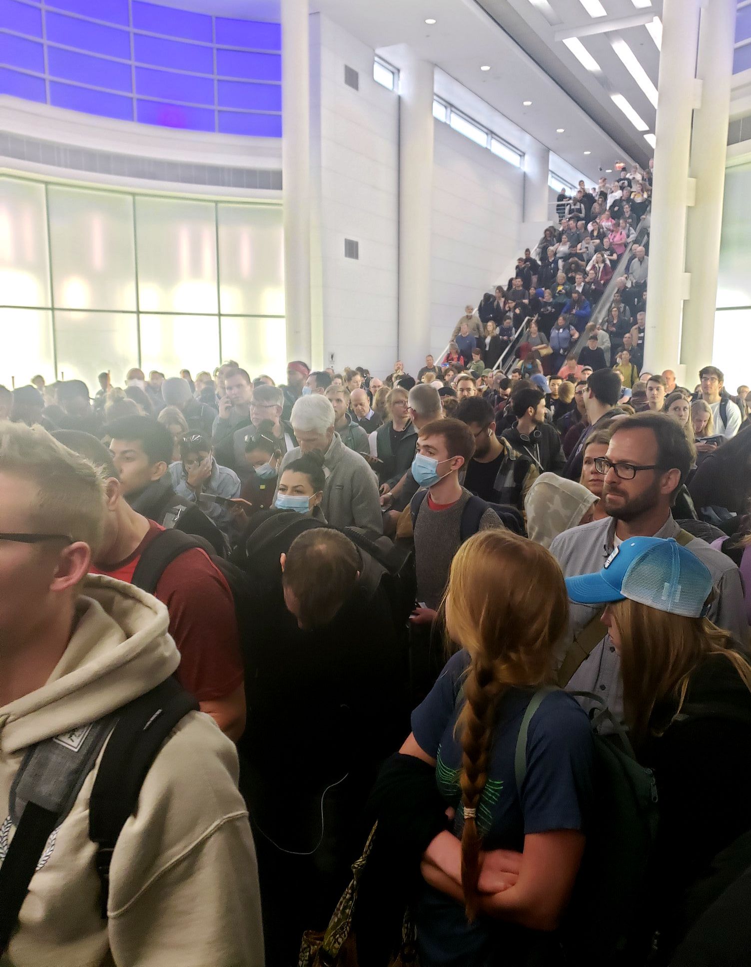 people in crowd at airport