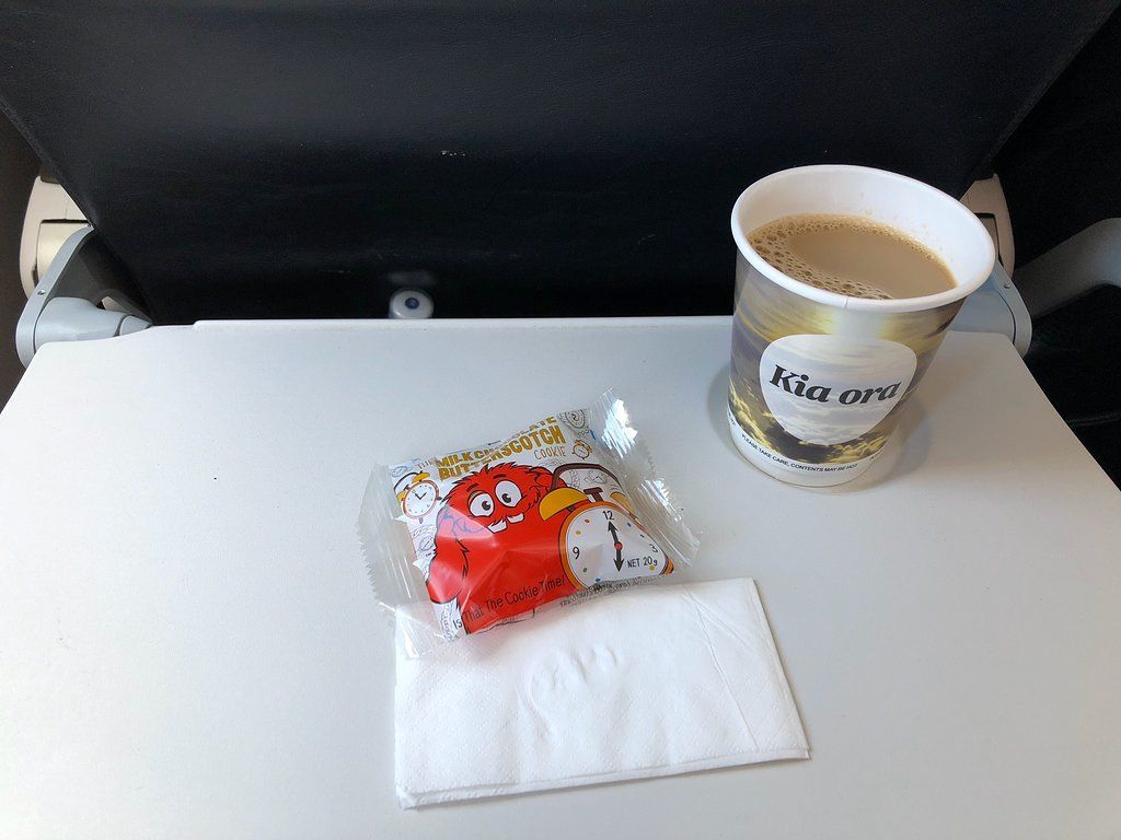 Small snack and beverage on an airplane