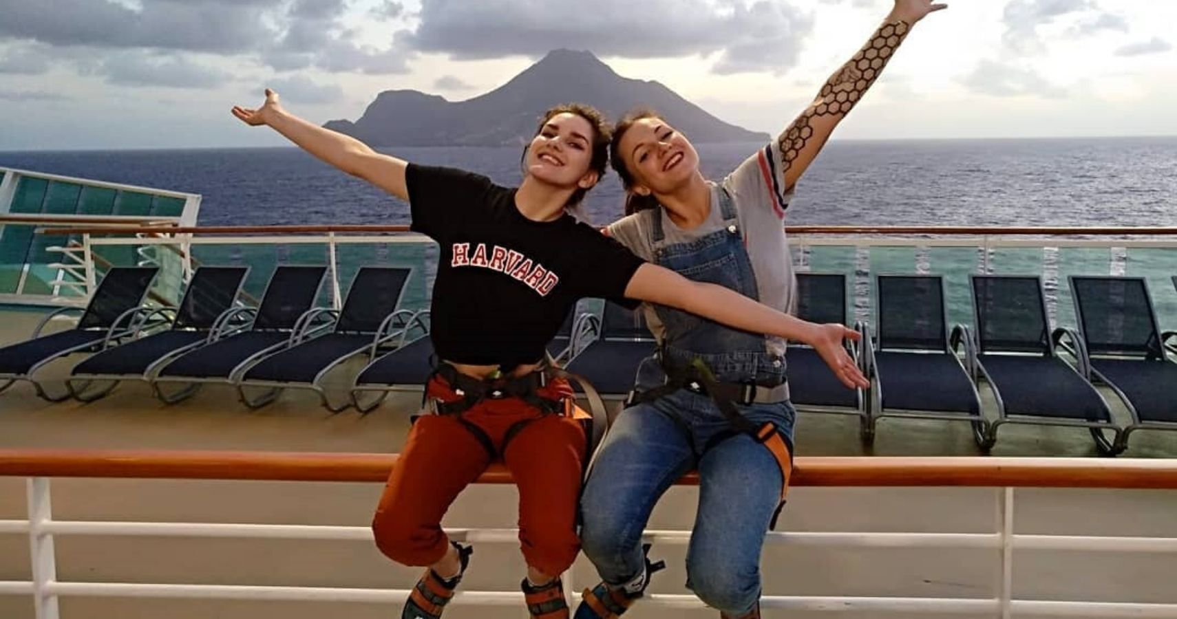 two people posing on a cruise ship