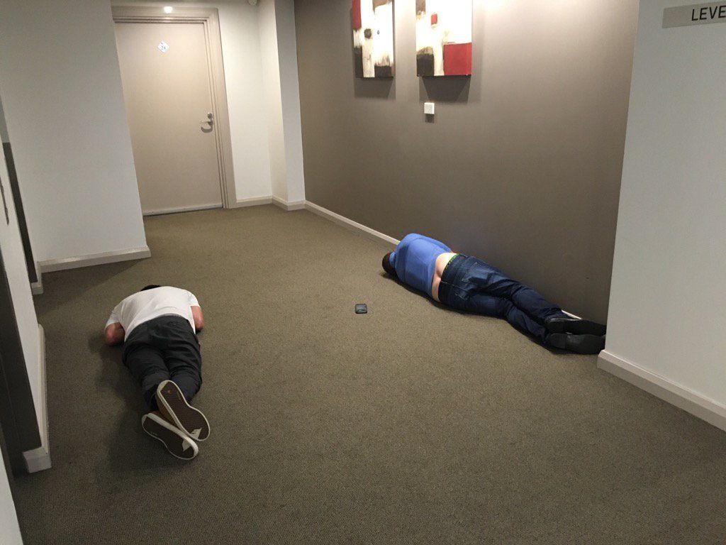 guys drunk on hotel floor