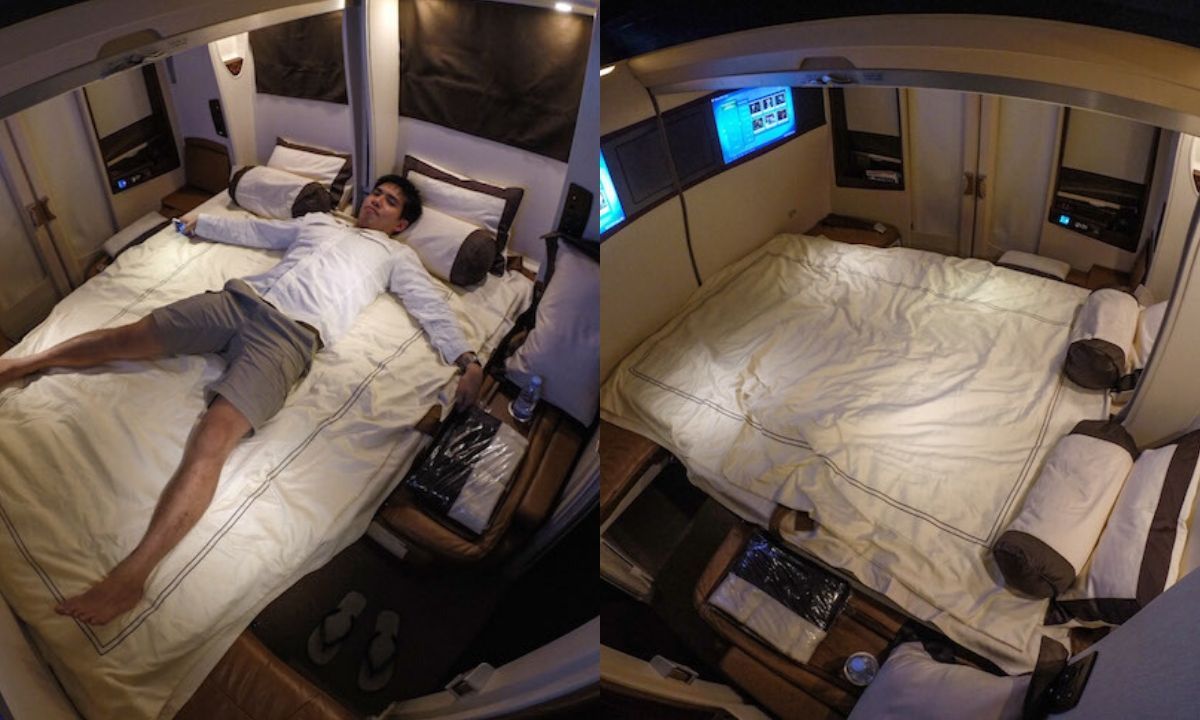 Man lying on an airline's first class bed