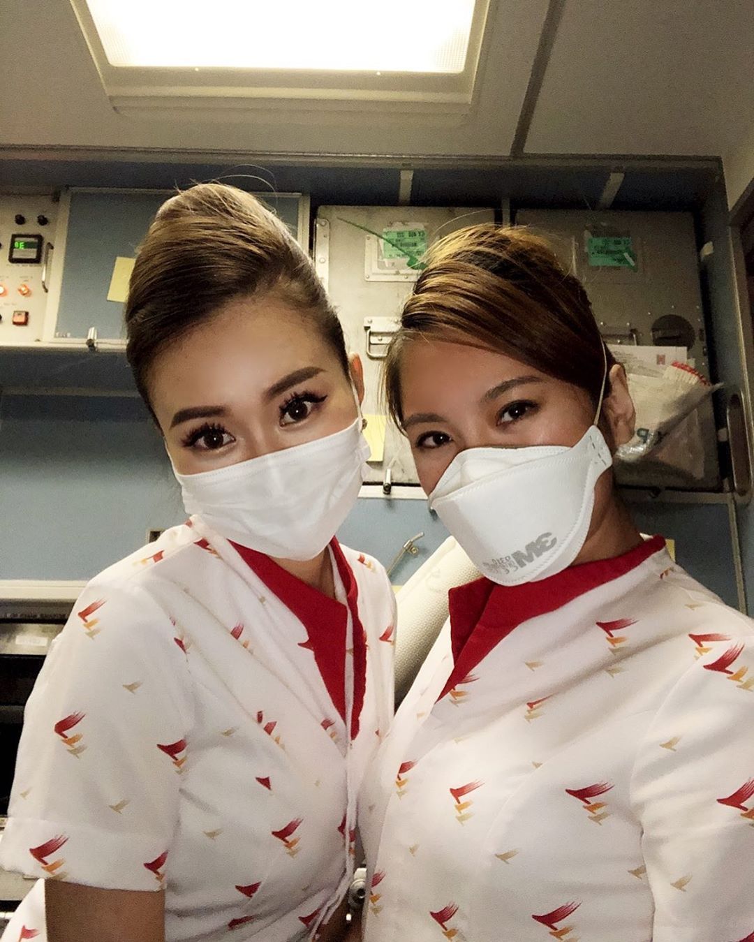 flight attendants with face masks