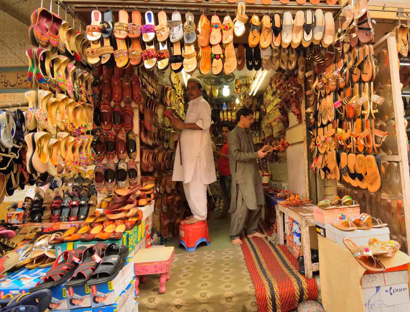 Vendors in a shoe stall in New Delhi