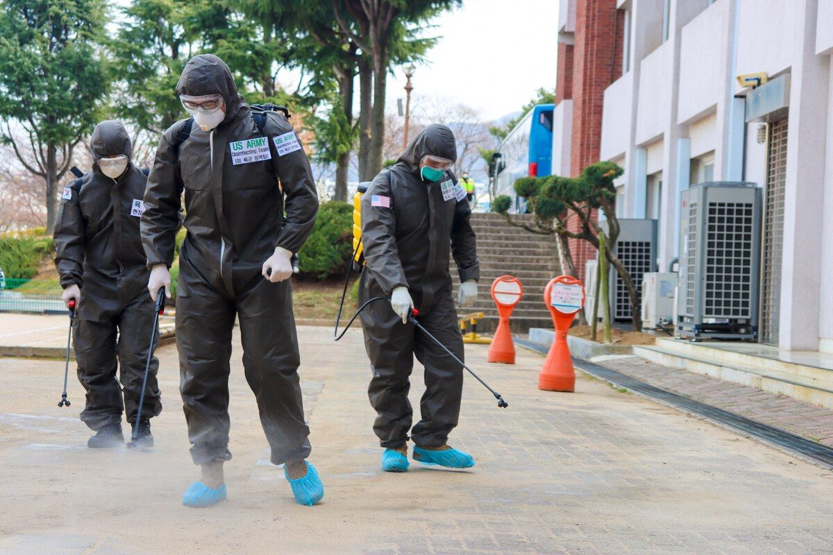 Military Officers sanitize and disinfect the streets of south korea