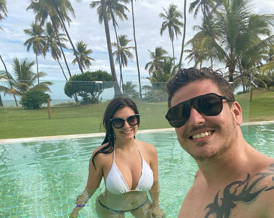 Couple in a pool at an all-inclusive resort