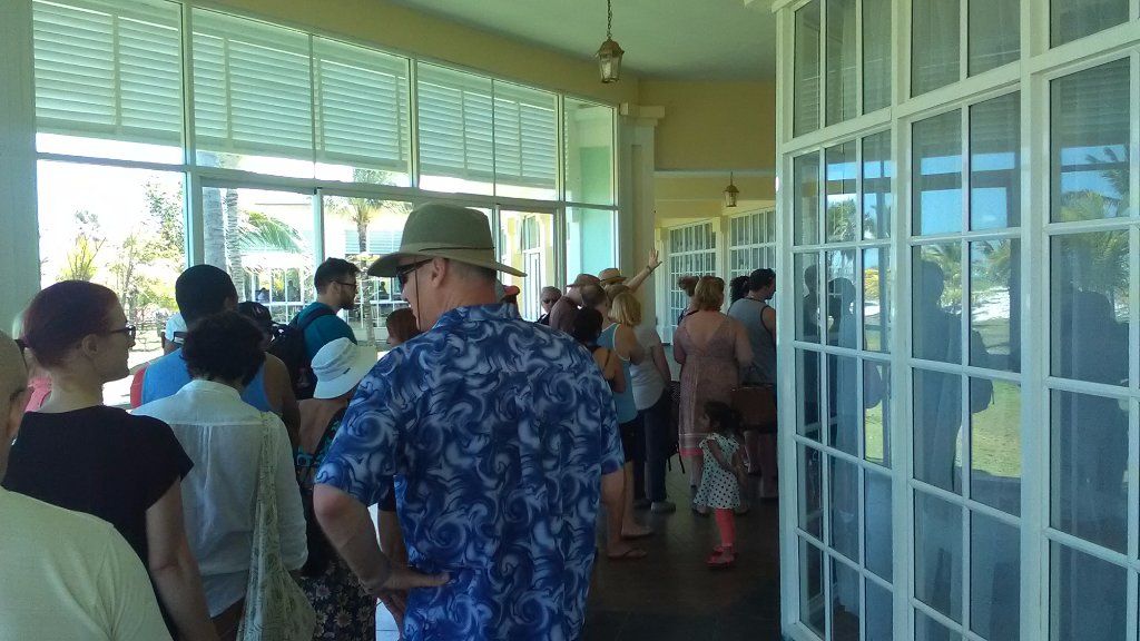 Customers waiting to get food at a resort