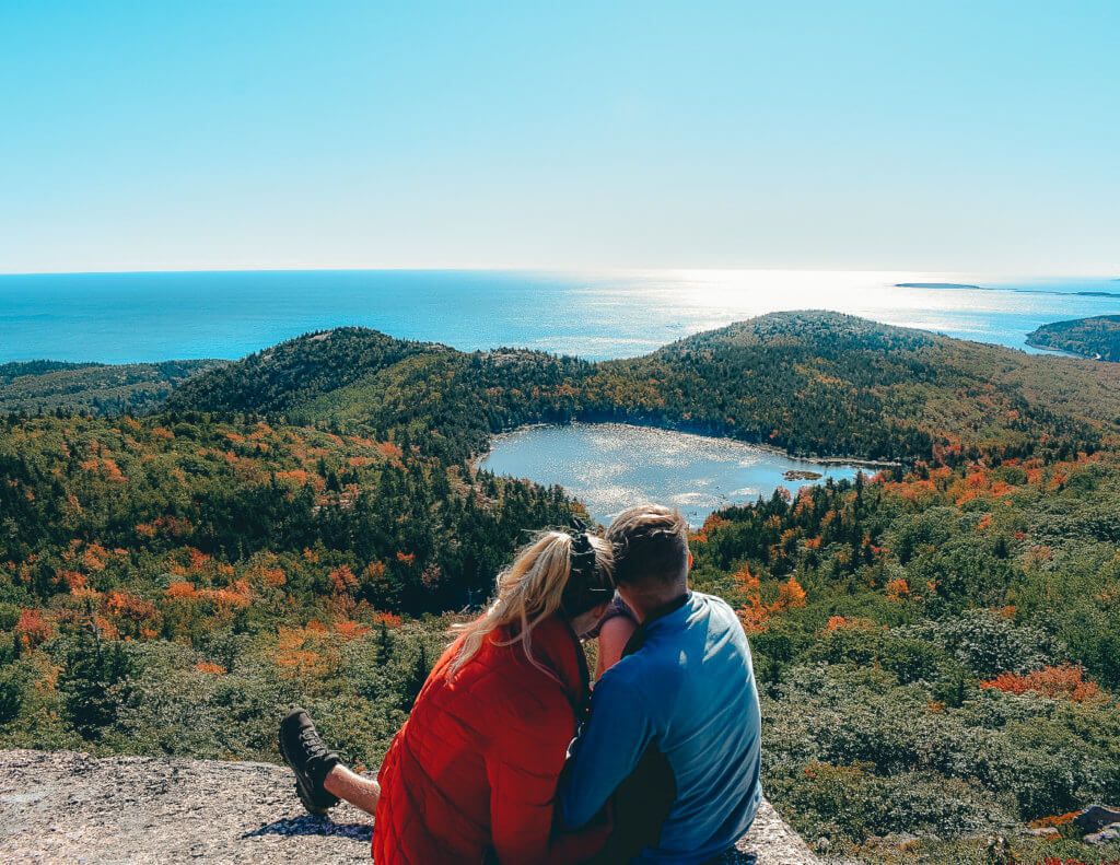 a couple takes in the sights of acadia national park, maine