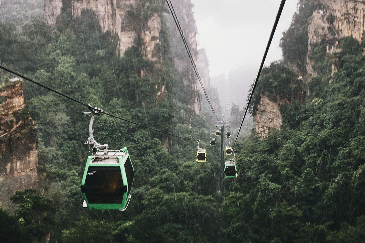 riding a cable car through the tianzi mountains