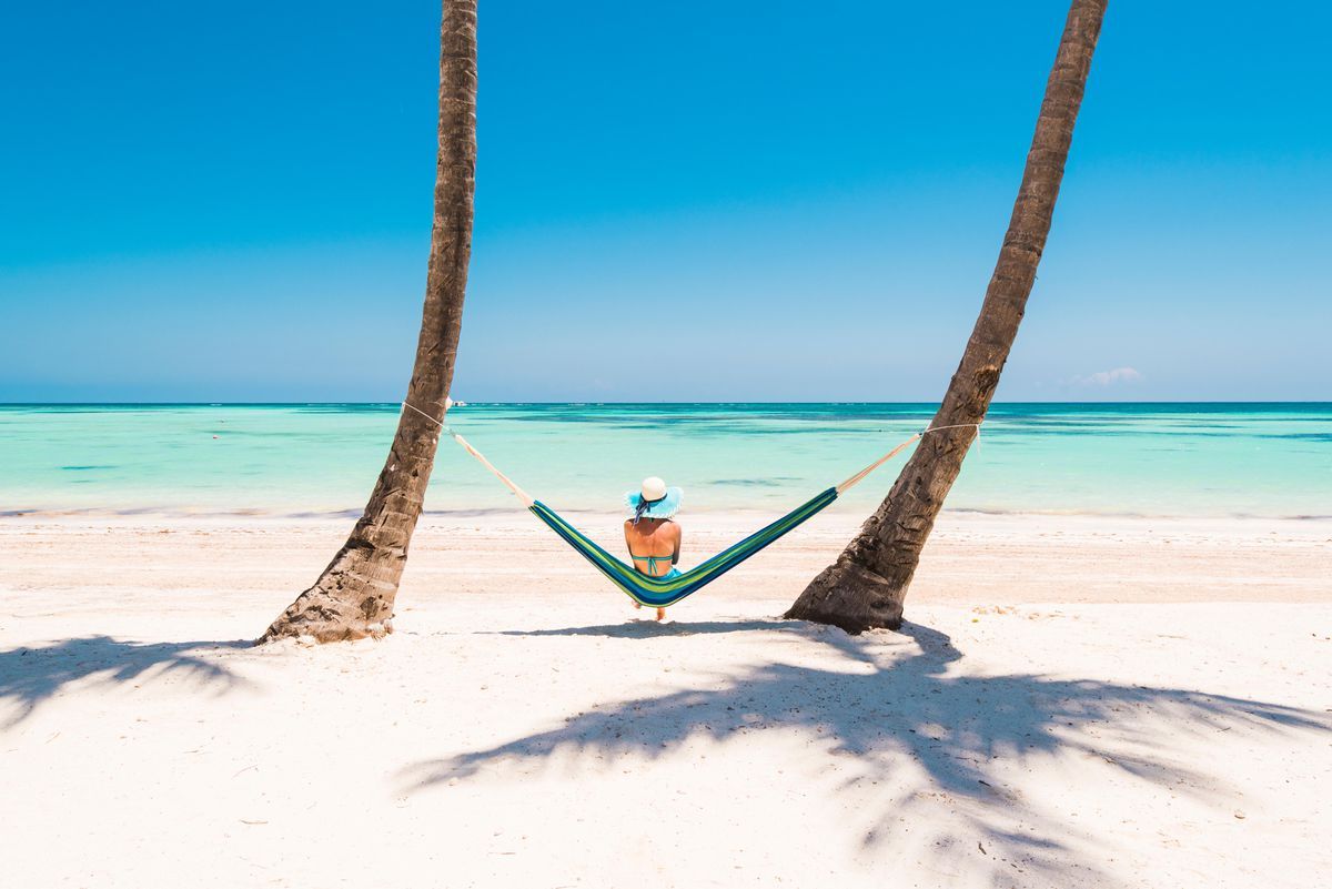 a woman on a hammock in turks and caicos