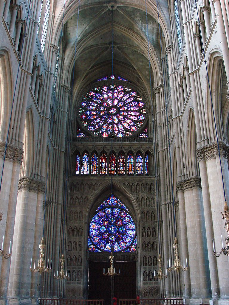 the stained glass windows inside notre dame