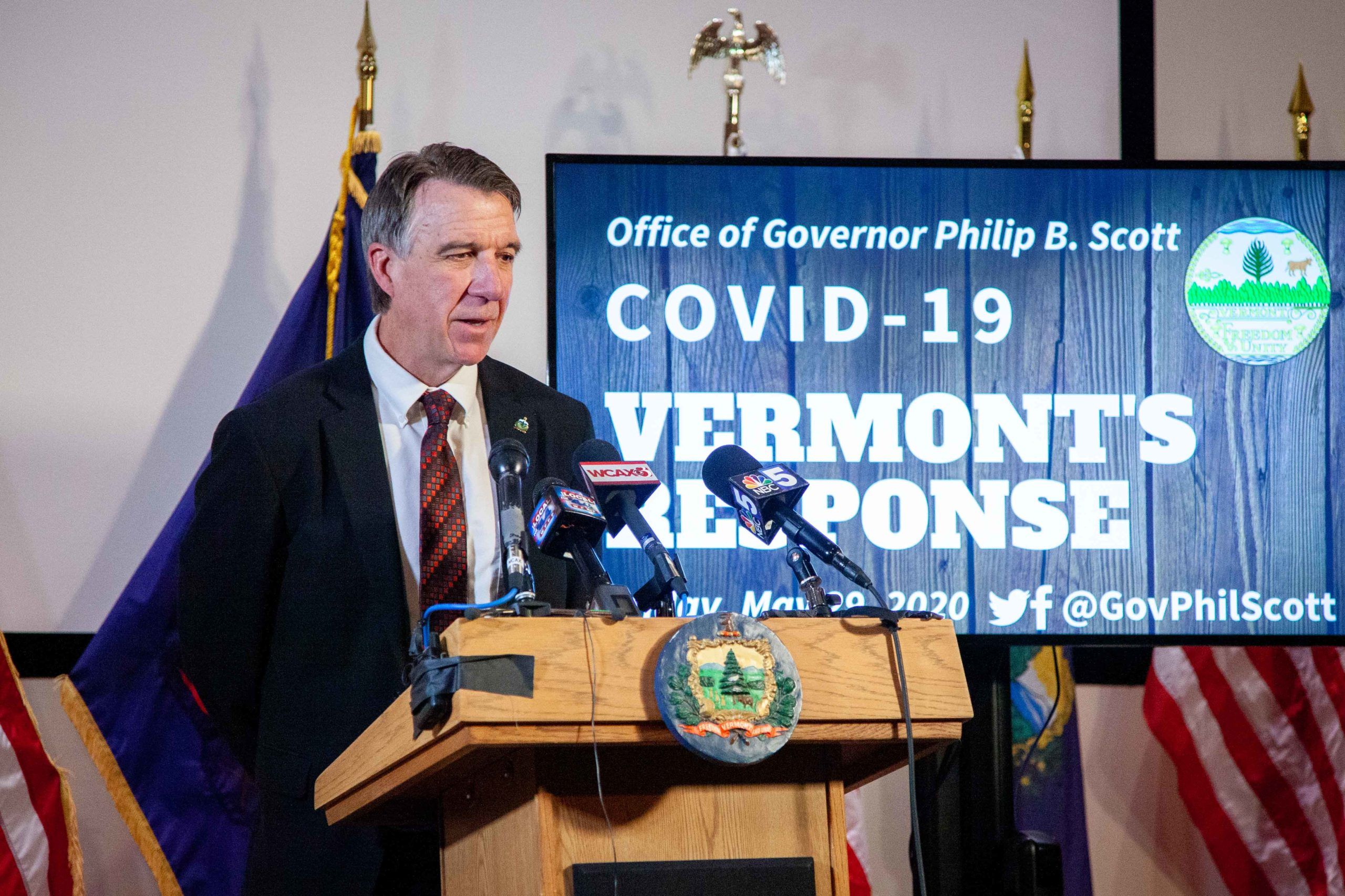 phil scott at a press conference for covid
