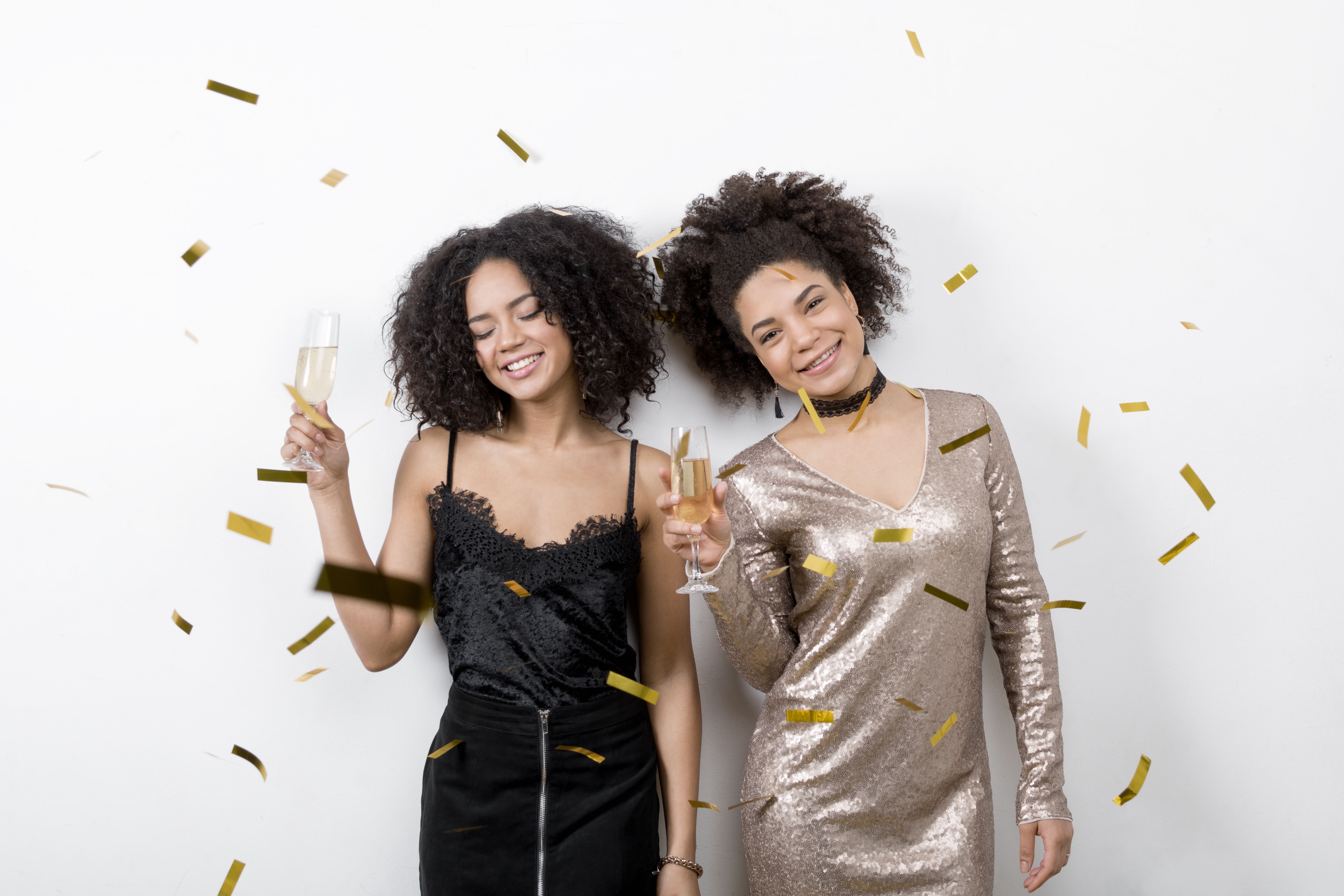 two girls dressed up for new years eve