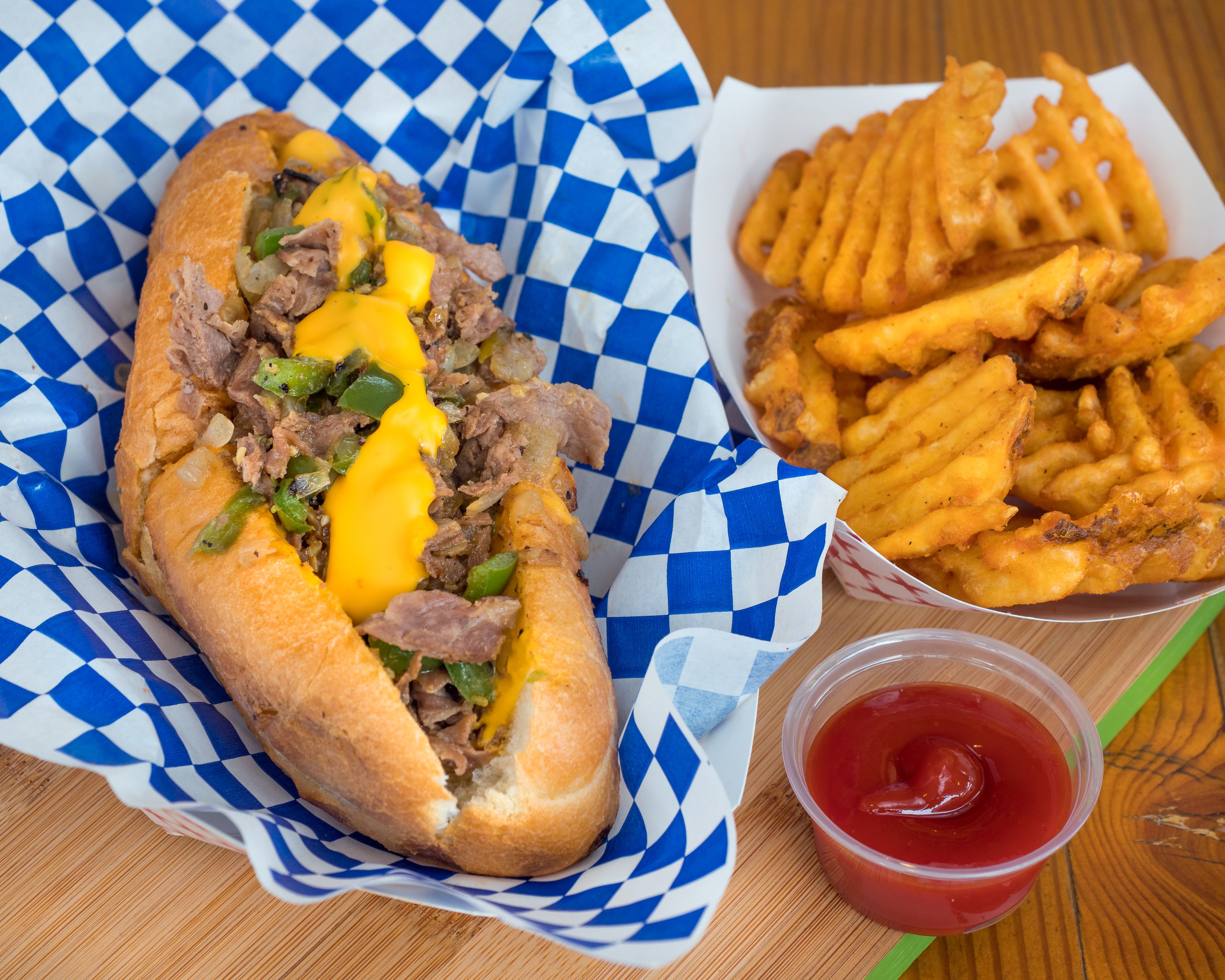 a cheesesteak and fries