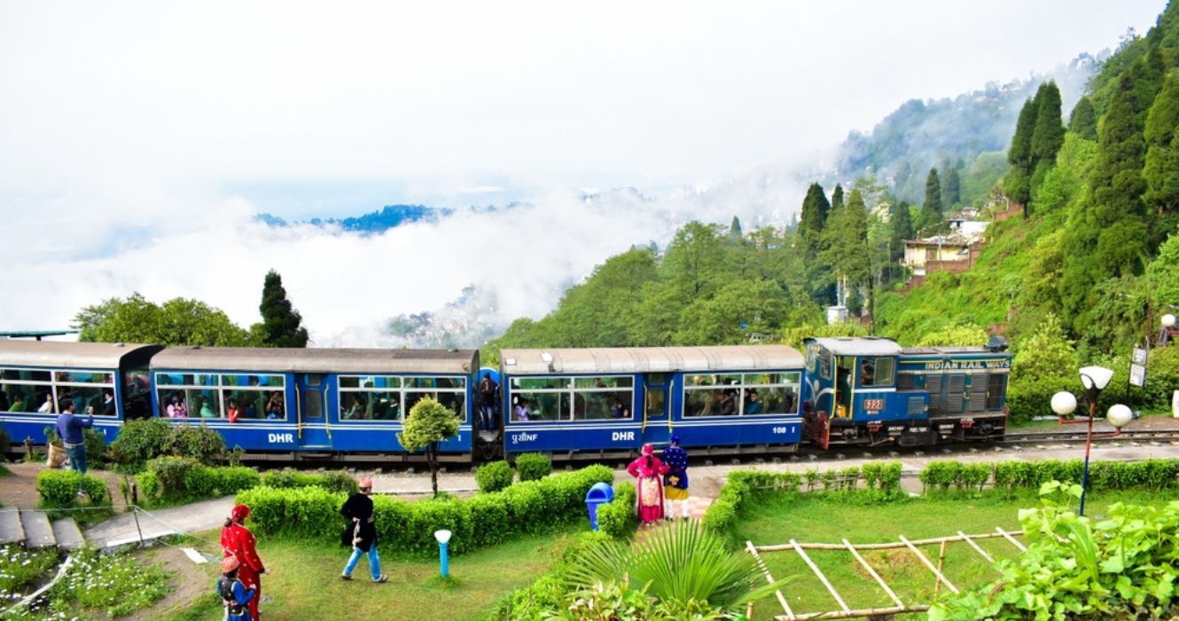 Train at edge of canyon Darjeeling India