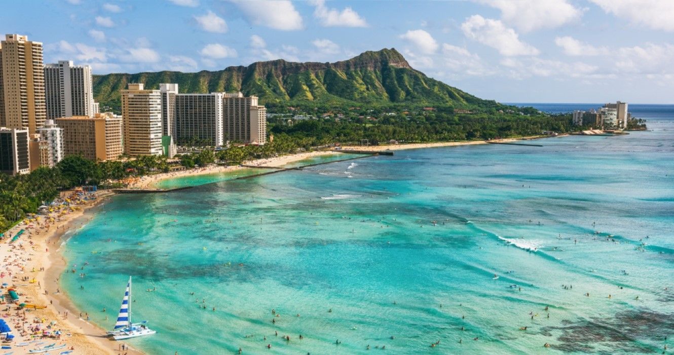 Waikiki beach and Diamond Head mountain peak at sunset, Oahu