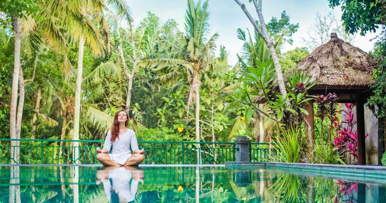 Girl meditating in a wellness retreat