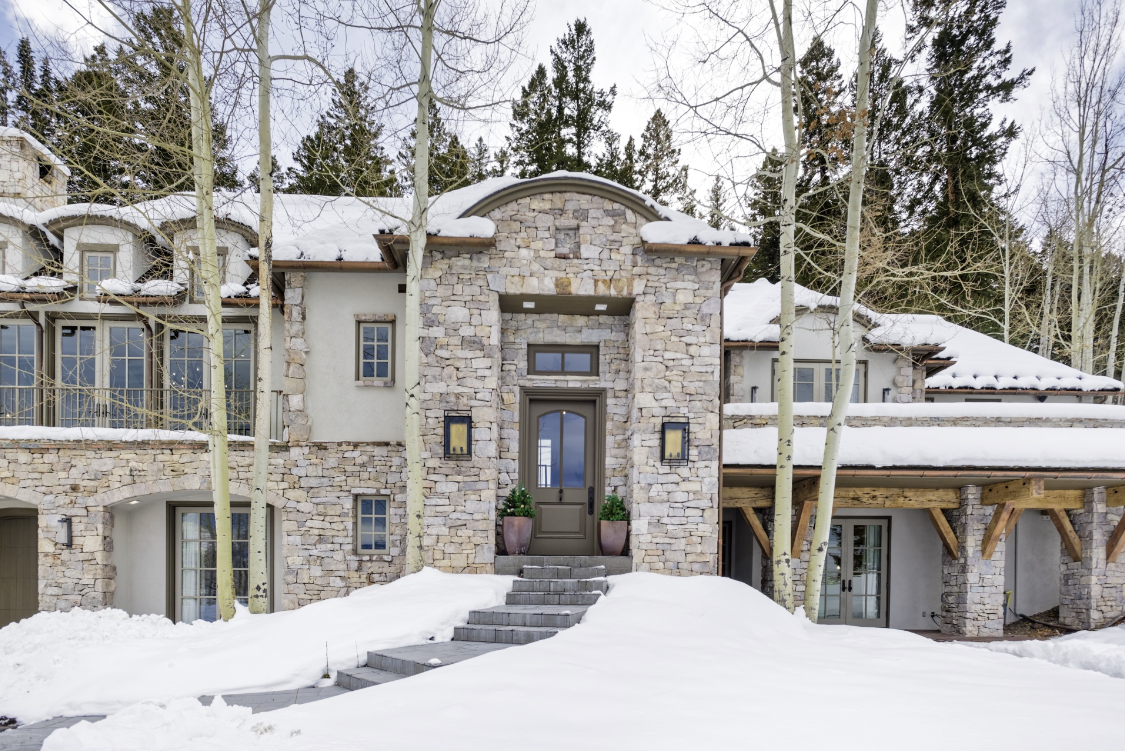 The front of Moore Villa covered in snow in Aspen, Colorado