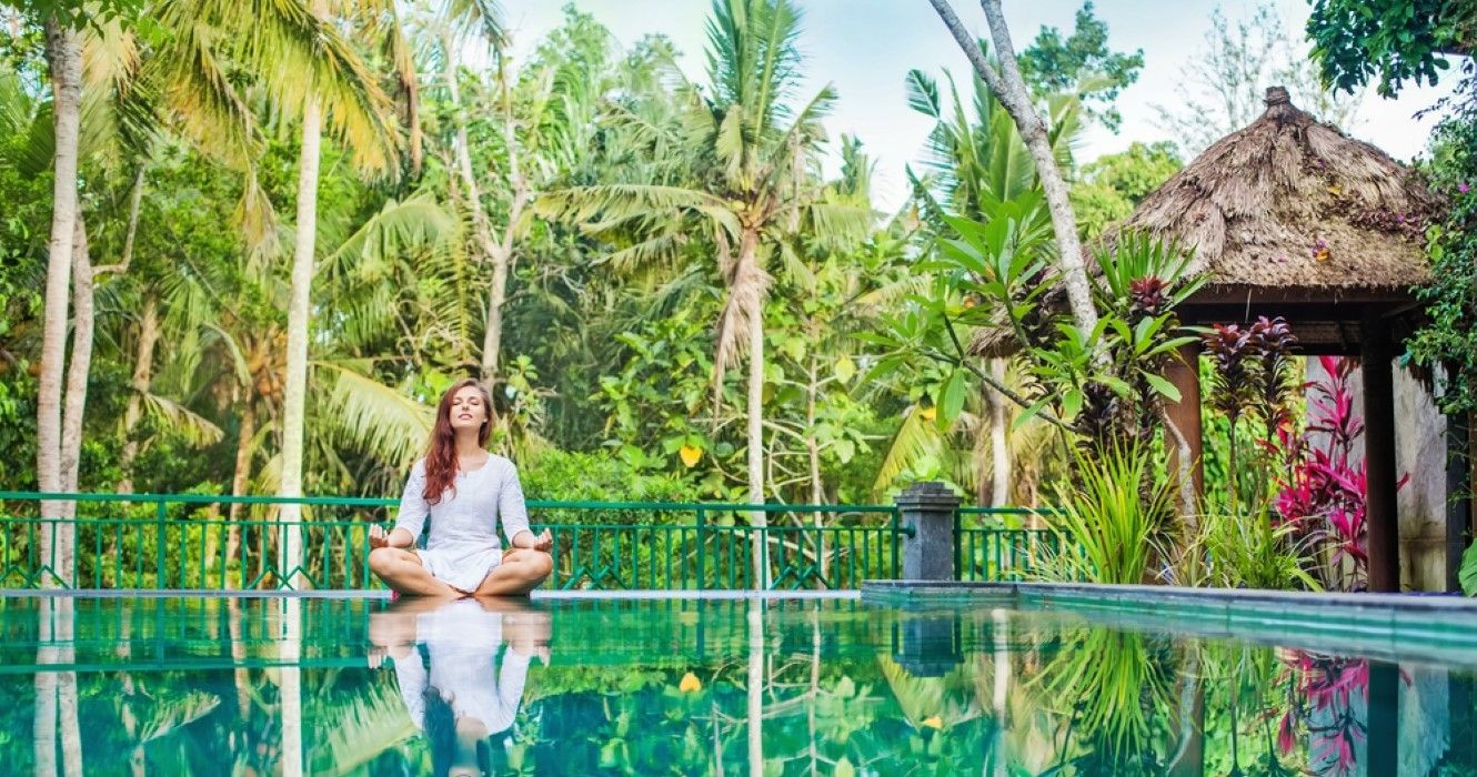 Woman meditating in a wellness retreat