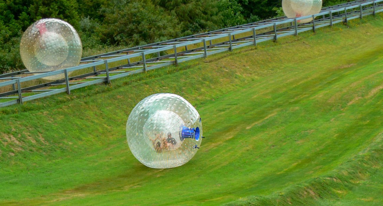 Zorbing down a hill in New Zealand