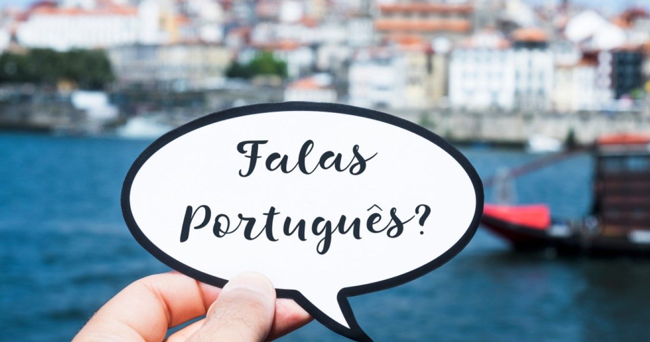 falas portugues, do you speak Portuguese sign written in Portuguese, in Porto, Portugal