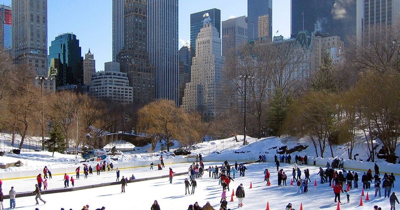 Kids and adults staking in Wollman Rink, the southern part of Central Park in New York