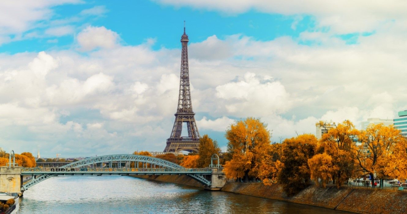 Eiffel Tower over the Seine river in the fall, Paris
